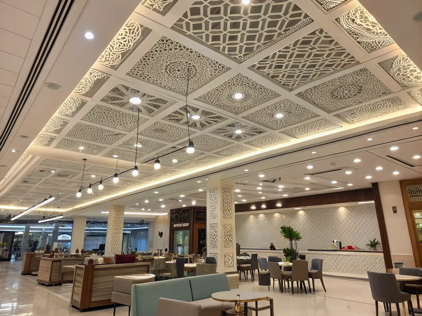 A picture of Architectural Expanded Metal used in a ceiling application, demonstrating its ability to diffuse light and create a unique visual effect.