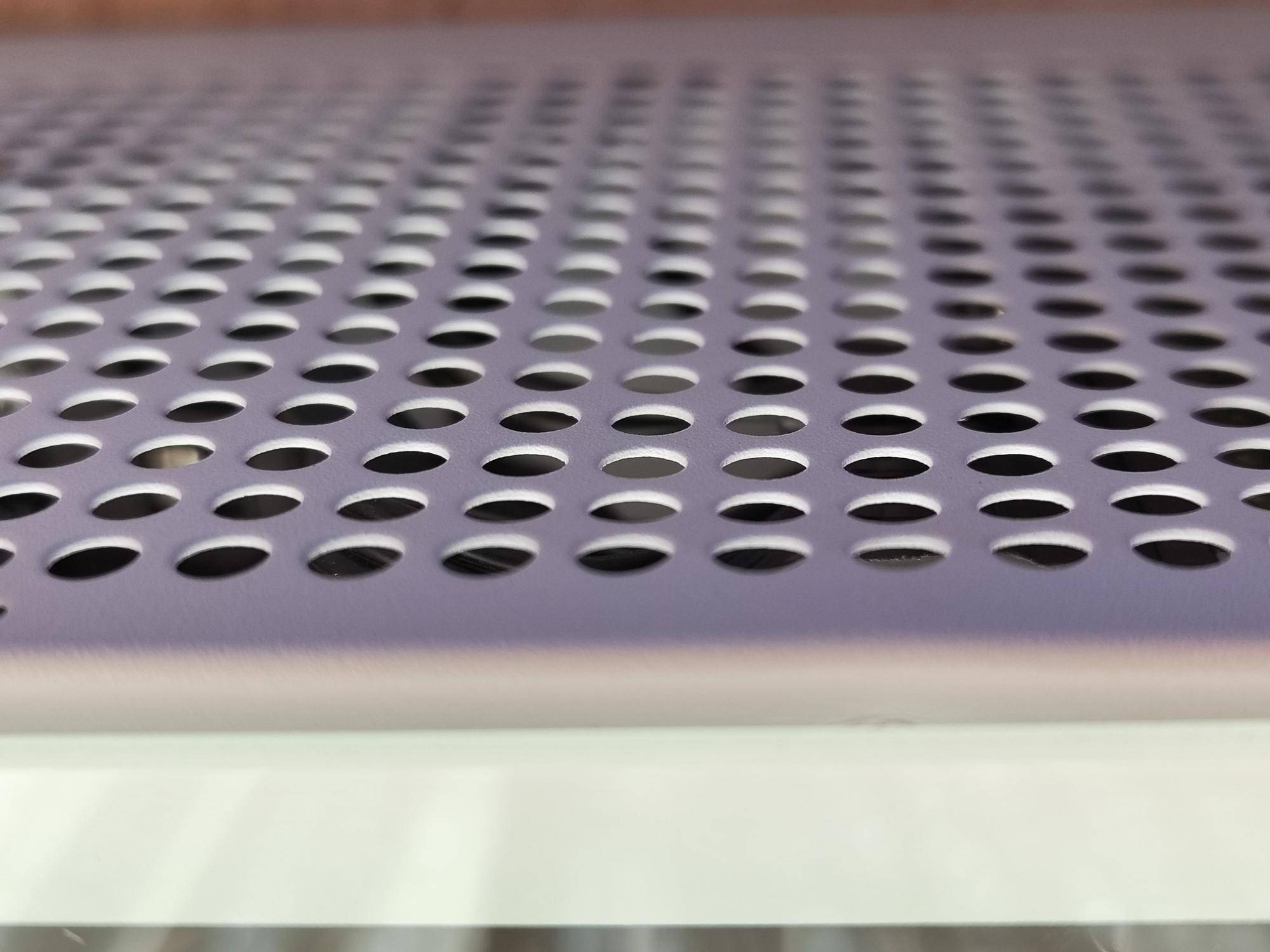 Close-up of Perforated Metal Sheet with Circular Holes