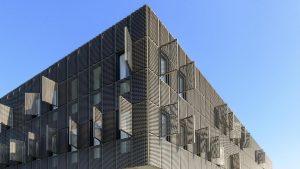 Expanded metal architectural screen system on a building facade(1)