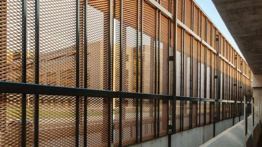 Expanded metal screen on a parking structure 3(1)