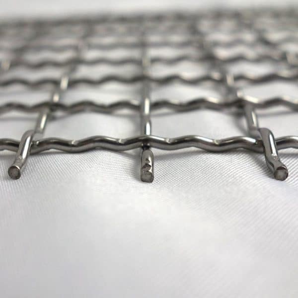 High carbon steel intermediate crimp wire mesh for screening applications.