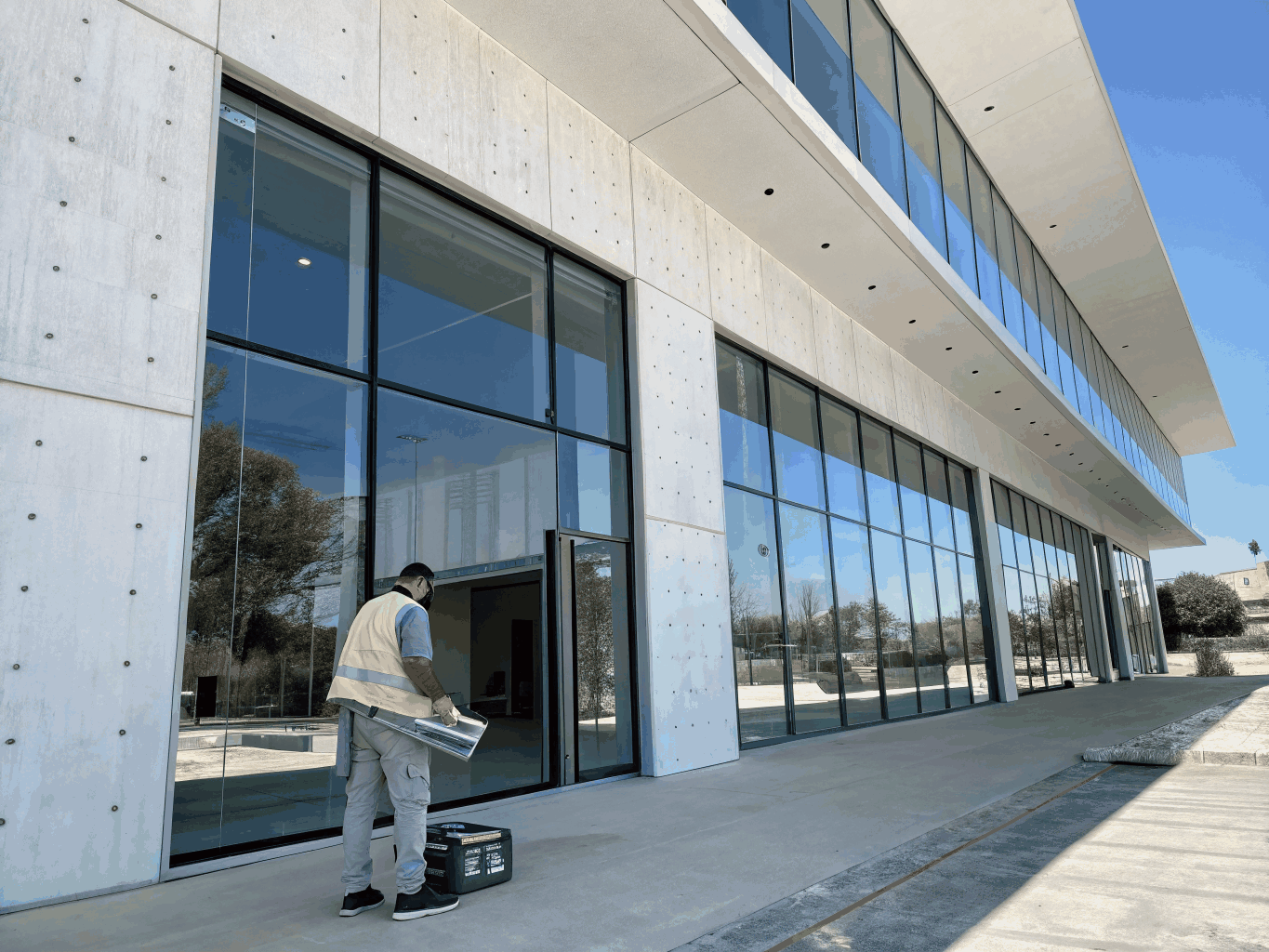 Industrial architectural perforated metal facade installed on commercial facility
