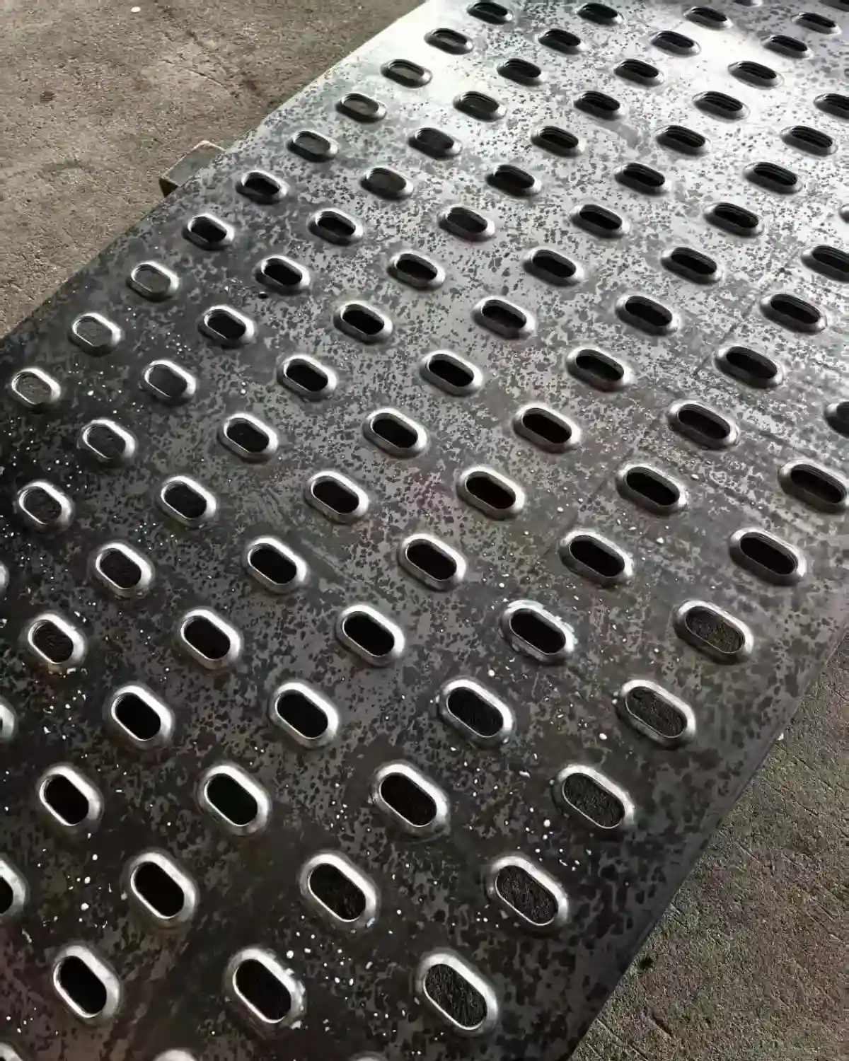 Checkered plate with raised diamond pattern