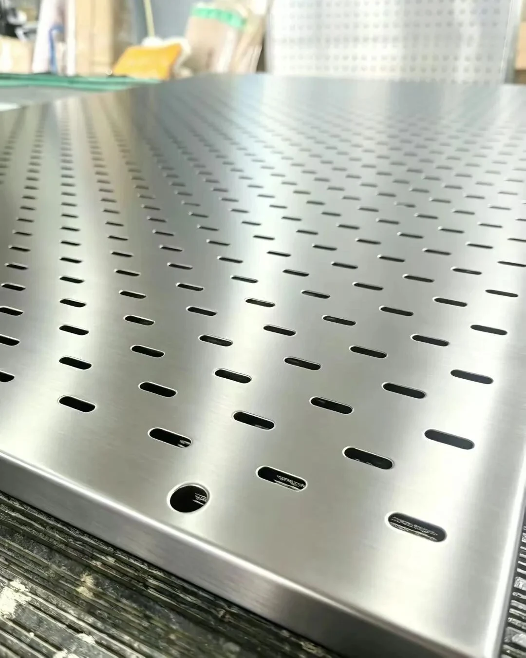 Precision punched perforated metal sheet pattern detail